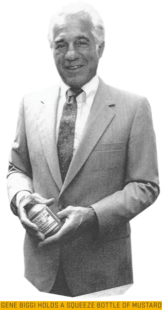 Gene Biggi holds a bottle of beaver brand mustard