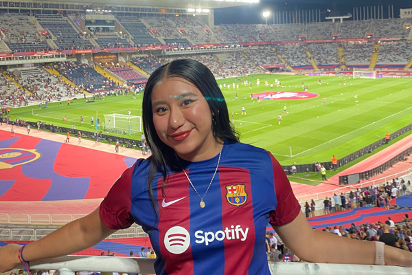 Marneli Pascacio in a Barcelona jersey at a soccer game in Spain