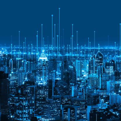 a simulation of a city in blue, with data points floating up out of the city