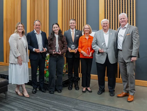 College of Business Award winners with Kate Papinsick and Dean Tim Carroll. Winners from left to right: Dom Biggi, Marilyn Califano, Scott Christiensen, Anita Winn, Ken Thrasher. 