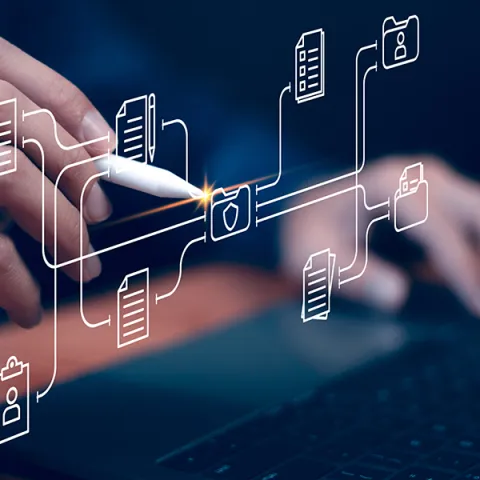 person tapping on a simulation of a file with a pencil