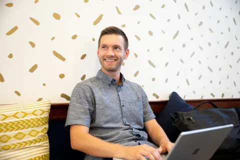 male student on laptop
